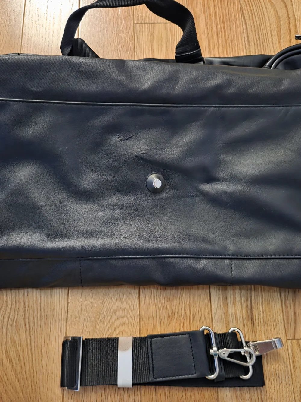 Versace Men's Black Leather Duffel Bag with Detachable Strap